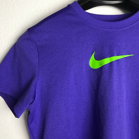 green and purple nike shirt